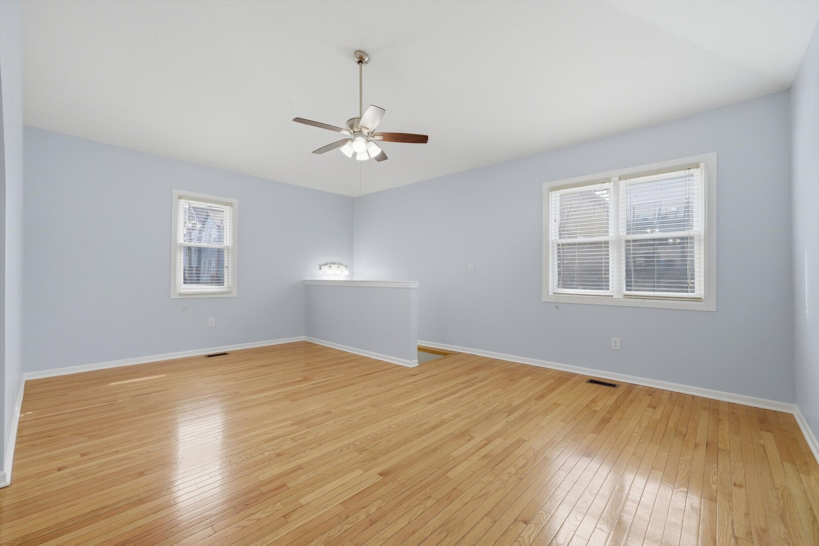 2125 West 18th Place, Unit 5 Chicago, IL 60608 - Photo 5 of 23 a view of empty room with wooden floor
