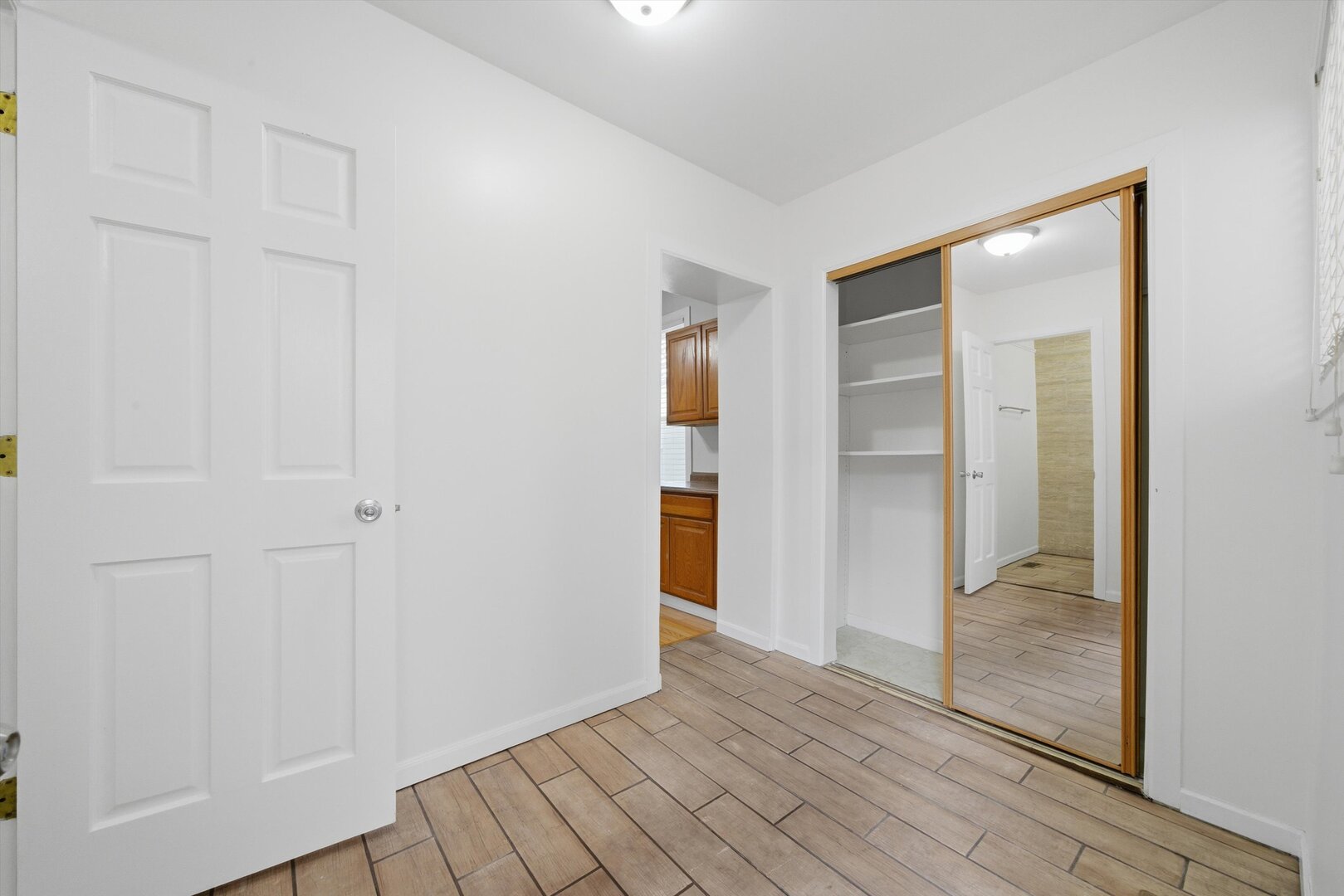 2125 West 18th Place, Unit 5 Chicago, IL 60608 - Photo 10 of 23 a view of hallway with wooden floor