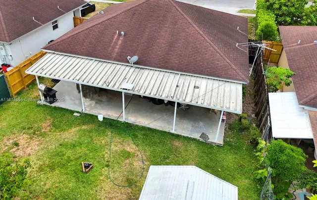 a view of a backyard with a garden