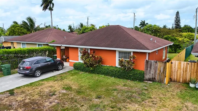 a house view with a garden space