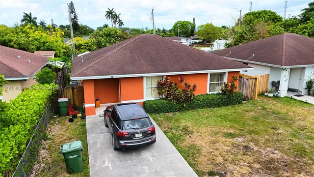 a car parked in front of a house