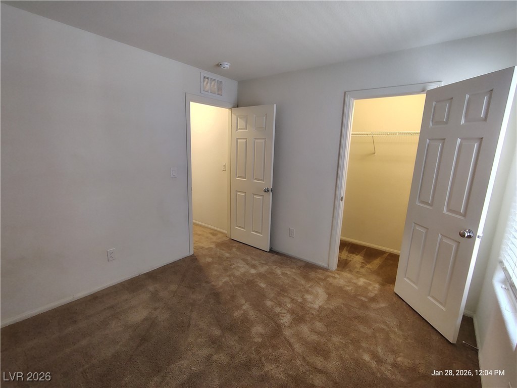 9300 Keystone Ridge Avenue Las Vegas, NV 89148 - Photo 9 of 20 Downstairs Bedroom w/ walk in closet