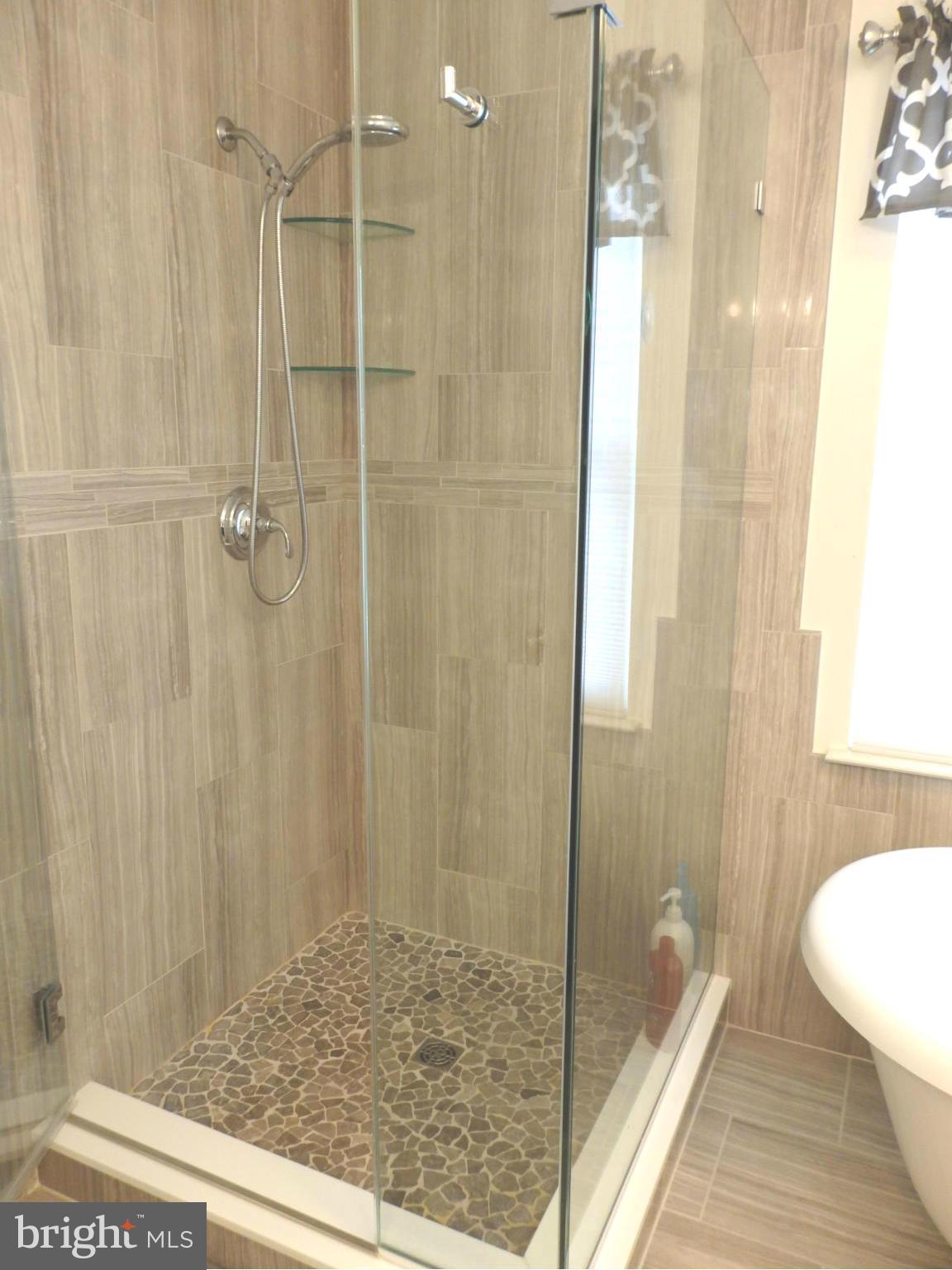 2236 Bear Den Road Frederick, MD 21701 - Photo 16 of 30 a bathroom with a shower