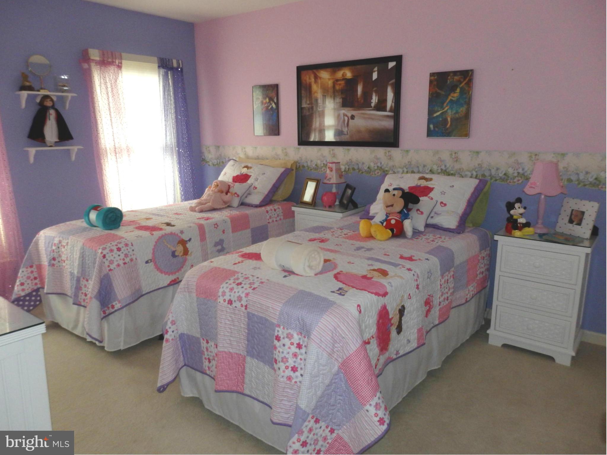 2236 Bear Den Road Frederick, MD 21701 - Photo 20 of 30 a bedroom with two beds and a couch