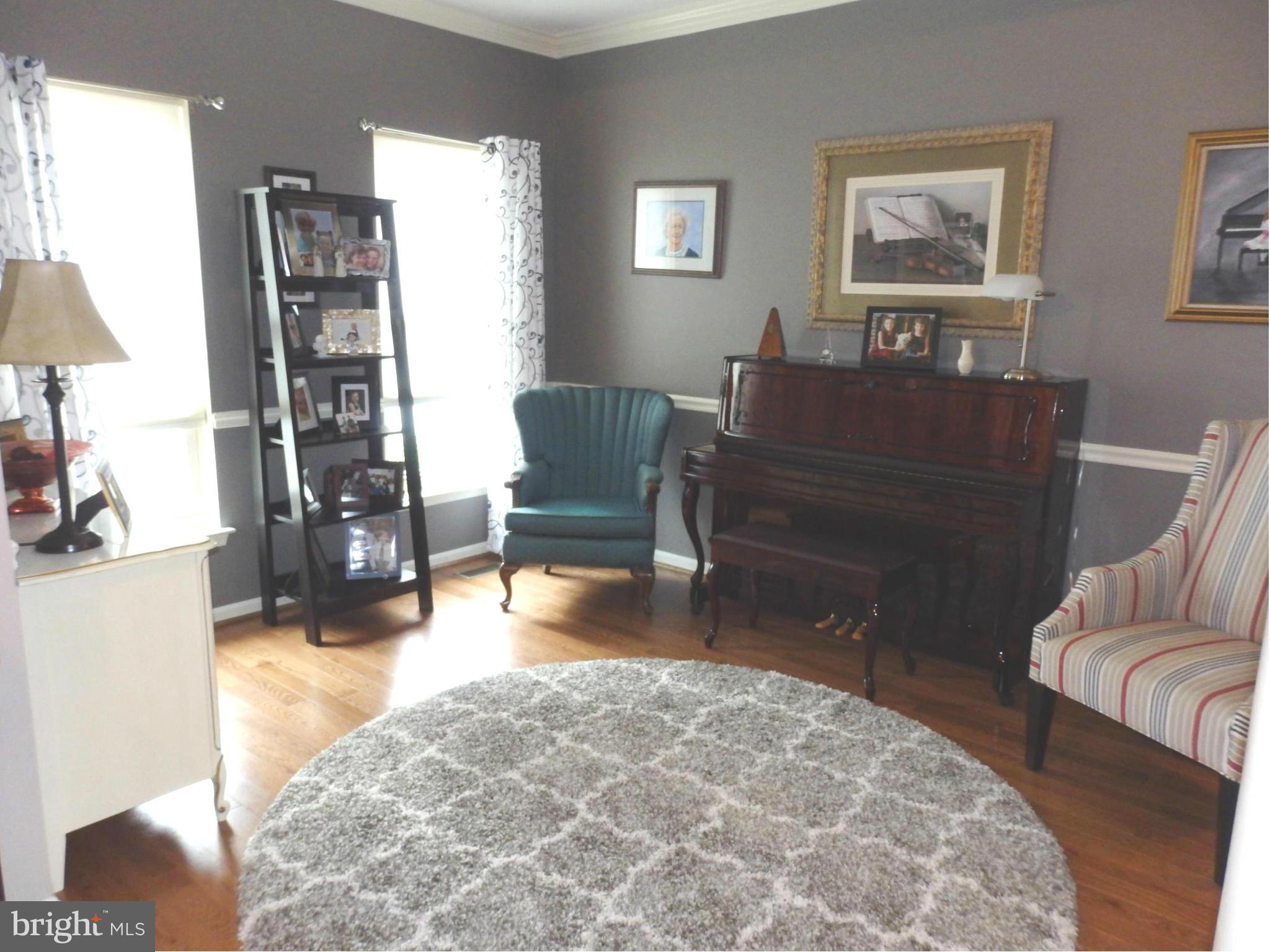 2236 Bear Den Road Frederick, MD 21701 - Photo 5 of 30 a living room with furniture and a couch