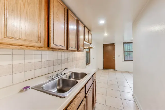 $94,900 | 7649 South Dobson Avenue, Chicago, IL 60619