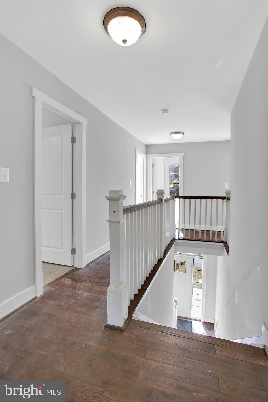 608 Powhatan Beach Road Pasadena, MD 21122 - Photo 12 of 28 Hardwood flooring in the upstairs hall