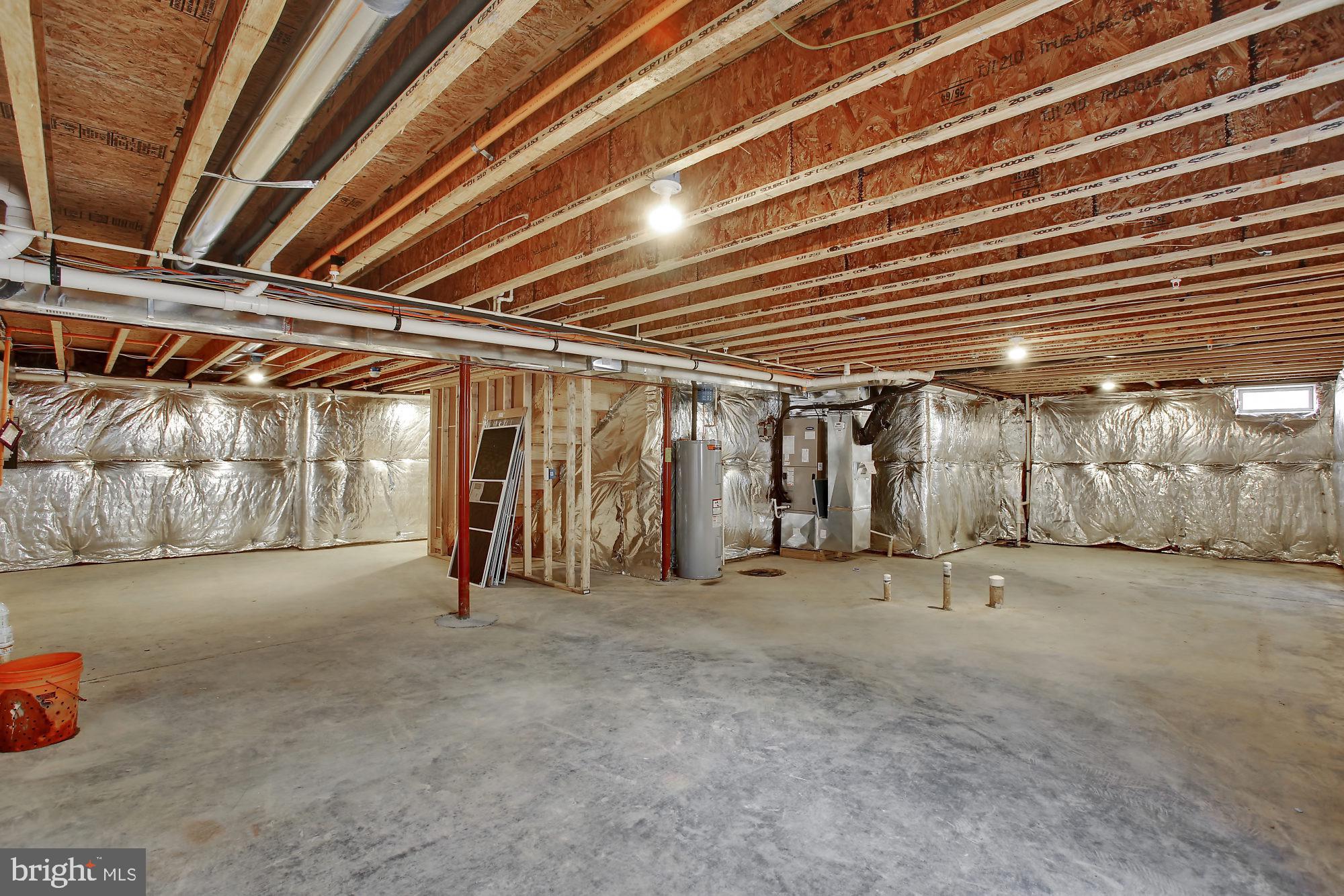 608 Powhatan Beach Road Pasadena, MD 21122 - Photo 23 of 28 Large basement with full bath rough in