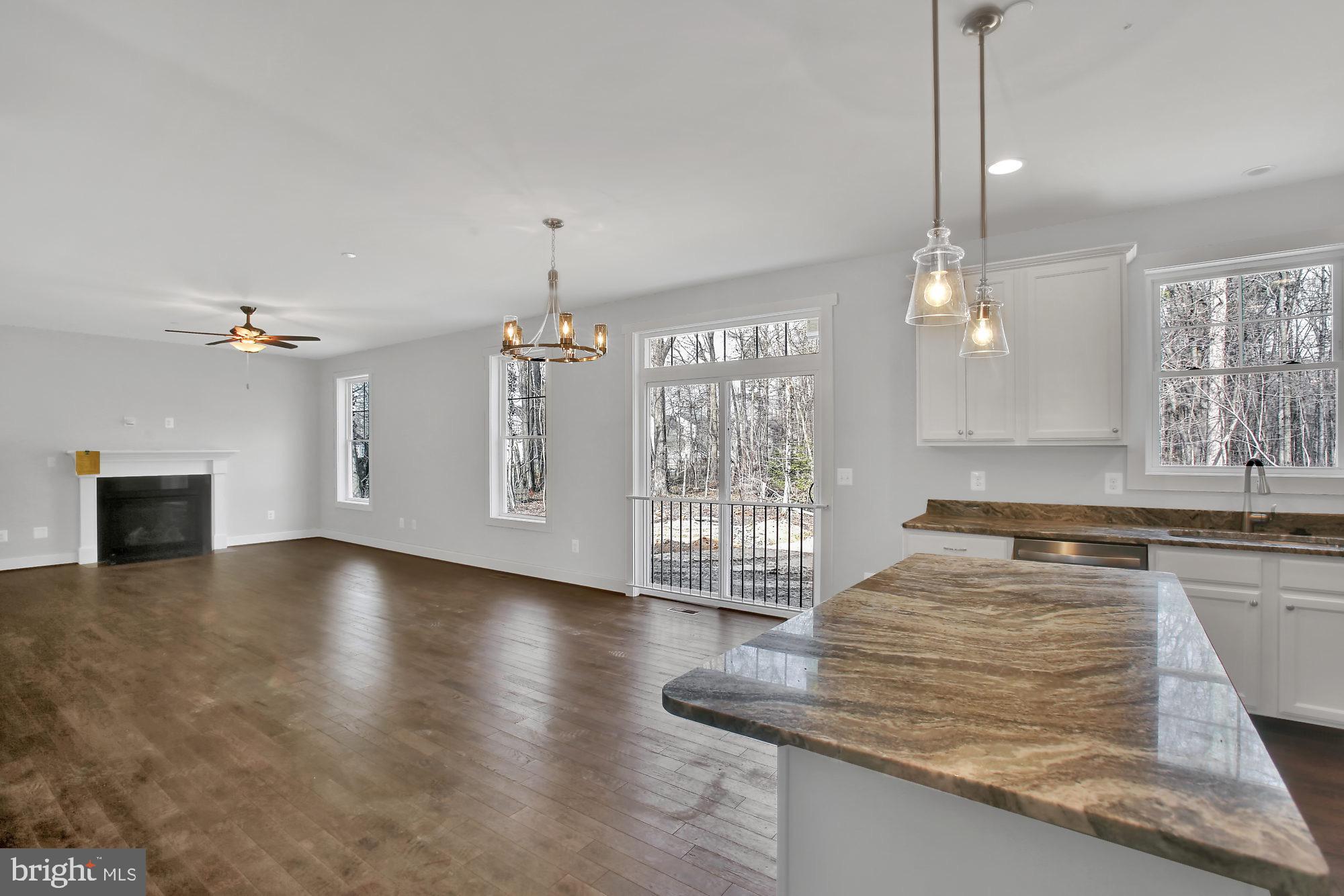 608 Powhatan Beach Road Pasadena, MD 21122 - Photo 5 of 28 Cozy fireplace