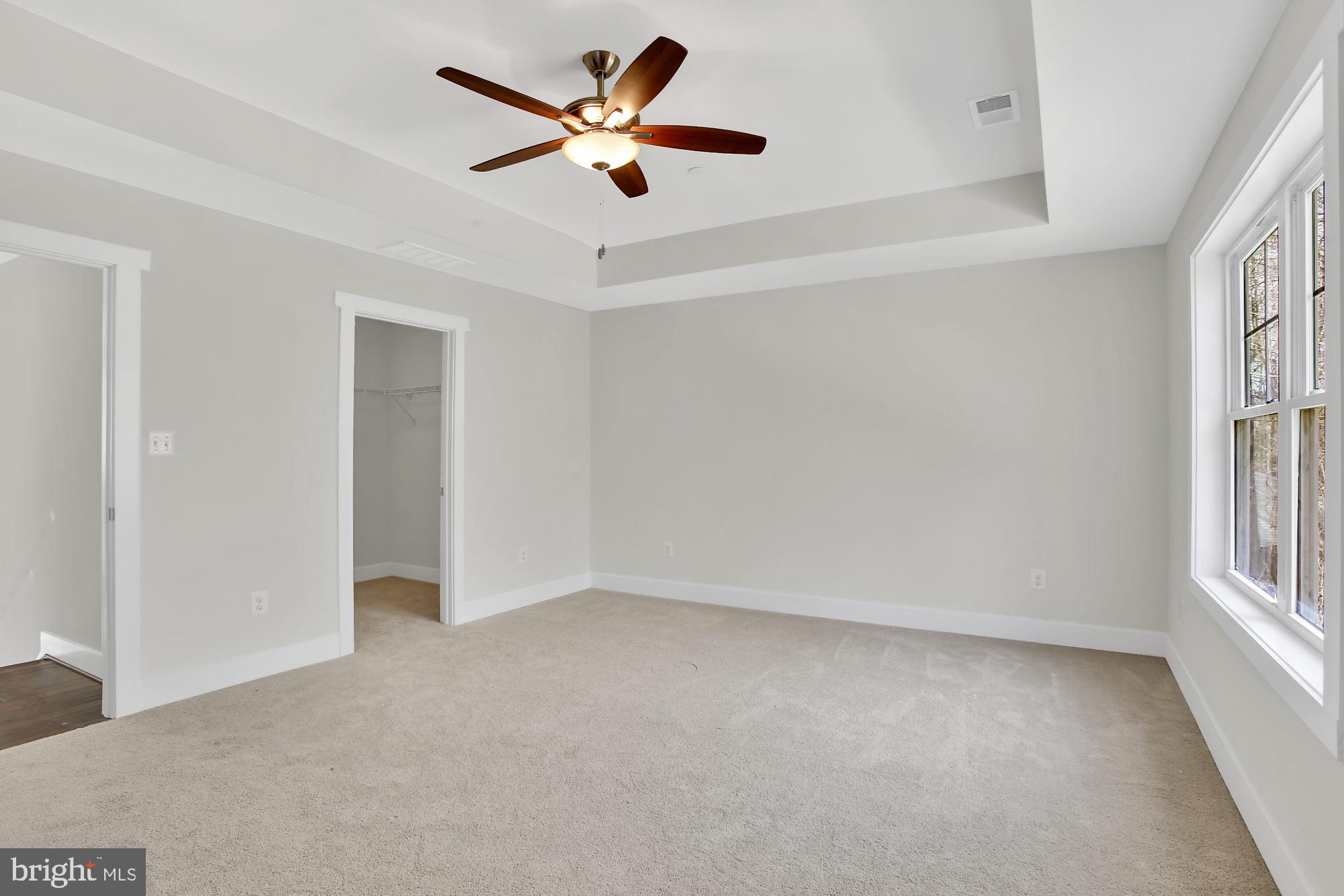 608 Powhatan Beach Road Pasadena, MD 21122 - Photo 10 of 28 Master bedroom tray ceilings and walk in closet