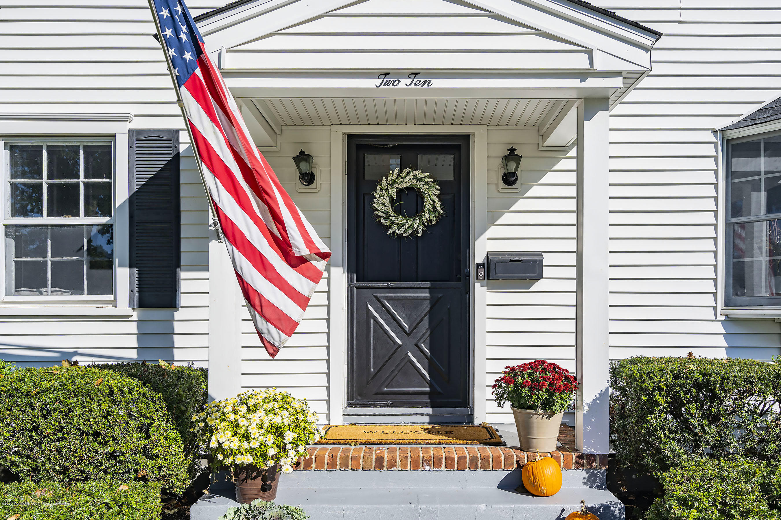 210 Pinckney Road Little Silver, NJ 07739 - Photo 1 of 28 a view of front door and potted plants