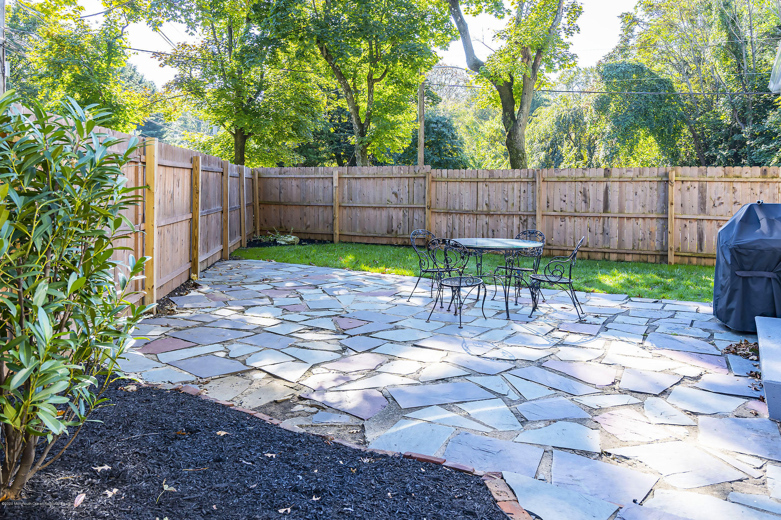 210 Pinckney Road Little Silver, NJ 07739 - Photo 26 of 28 a backyard of a house with green garden