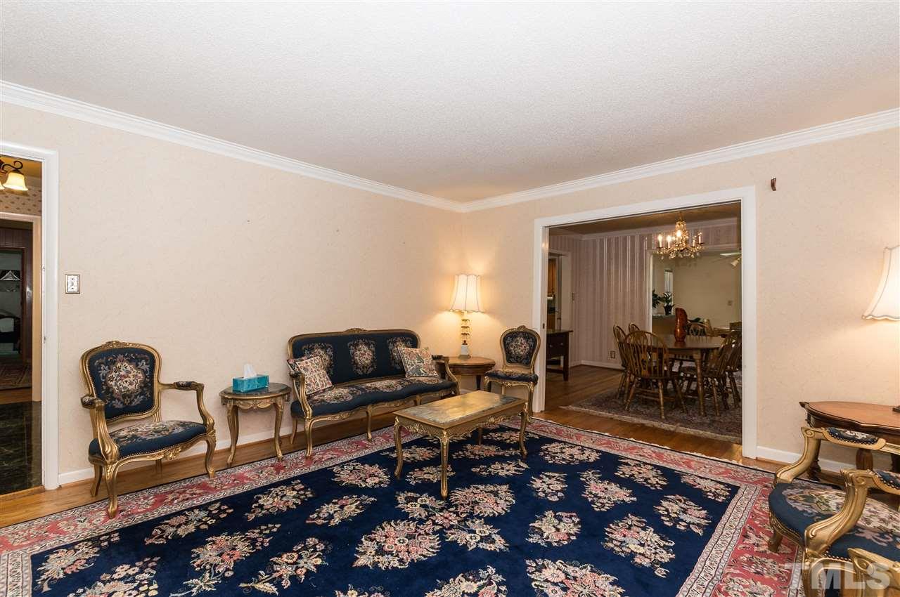 1926 Highland Place Raleigh, NC 27607 - Photo 3 of 23 a living room with furniture rug and window