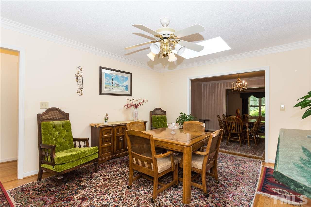 1926 Highland Place Raleigh, NC 27607 - Photo 10 of 23 a view of a dining room with furniture