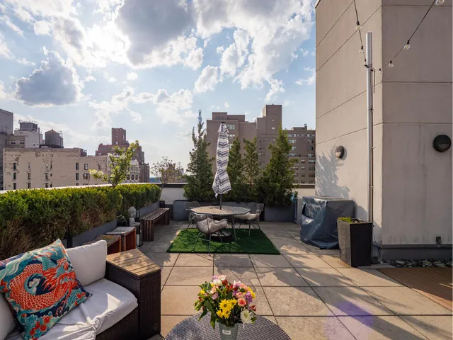 a view of a city with tall buildings