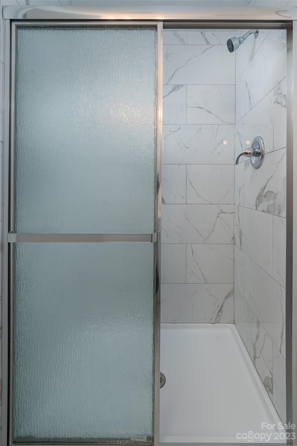 9333 Old Concord Road, Unit J Charlotte, NC 28213 - Photo 13 of 17 a bathroom with a shower