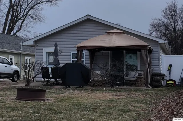 a view of a house with patio