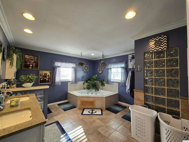 a view of a dining room with furniture and window