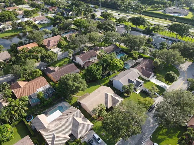 an aerial view of residential house with outdoor space