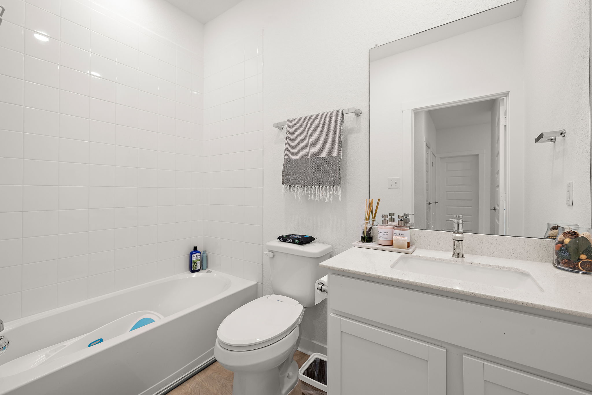 2313 Ranier Court Austin, TX 78754 - Photo 18 of 22 a bathroom with a sink toilet and a bathtub