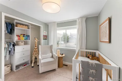 a room with furniture and a window