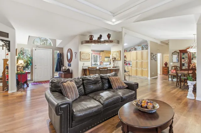 a kitchen with a sink and a white cabinets