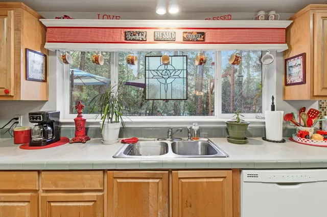 a view of livingroom with furniture and a flat screen tv