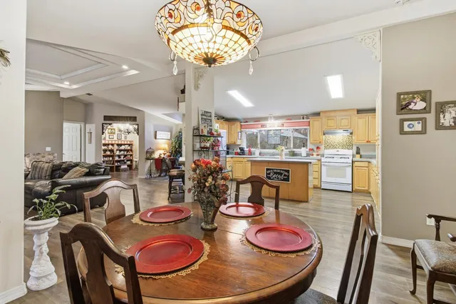 a bathroom with a bathtub sink and mirror