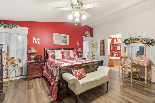 a view of dirt yard with a tree