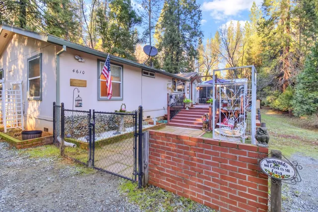 a view of a chairs and table in the wooden floor