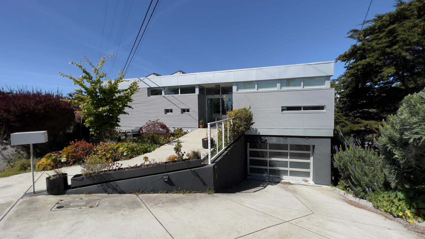 451 Talbot Avenue Pacifica, CA 94044 - Photo 26 of 38 a front view of a house with a yard