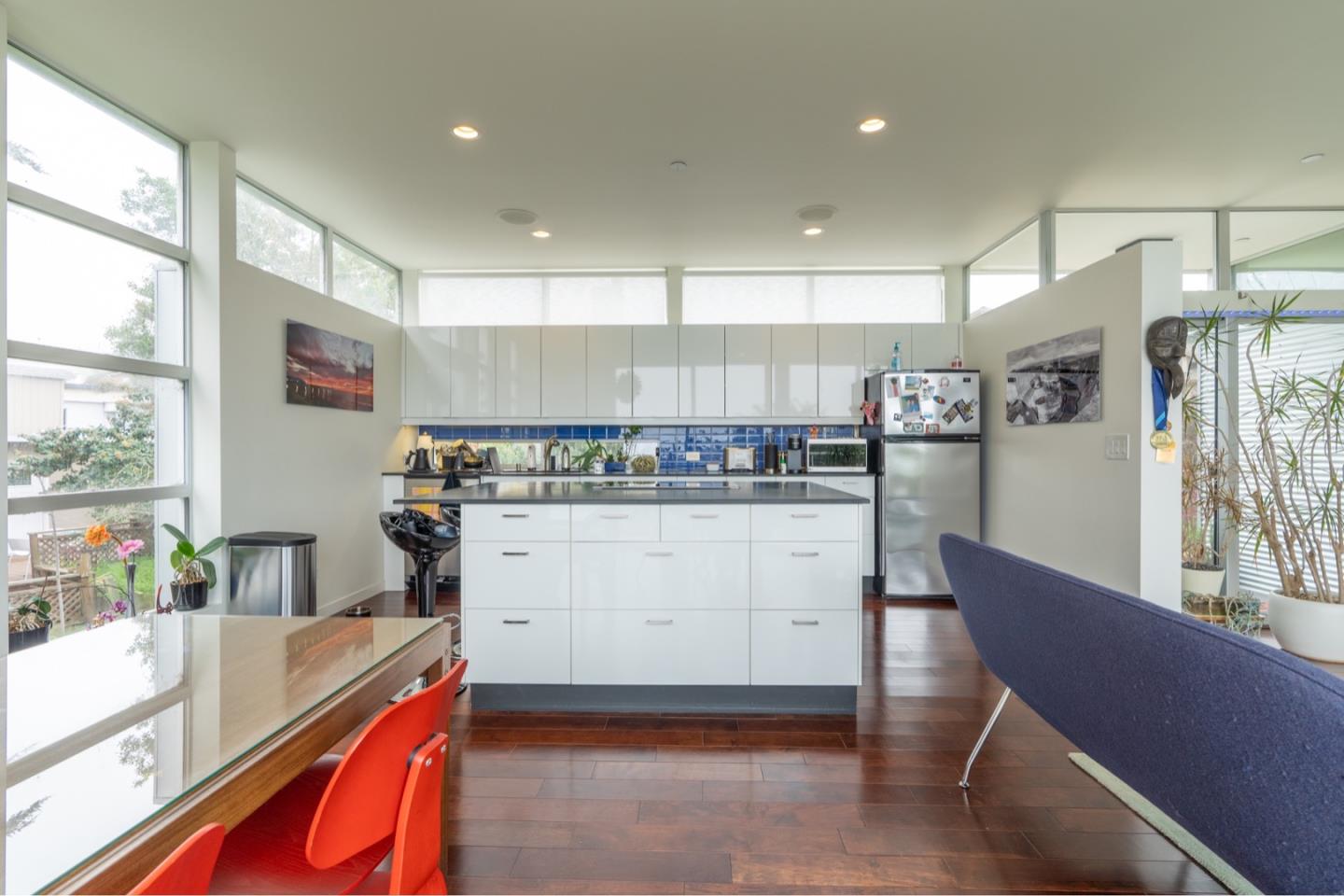 451 Talbot Avenue Pacifica, CA 94044 - Photo 8 of 38 a kitchen with white cabinets and refrigerator