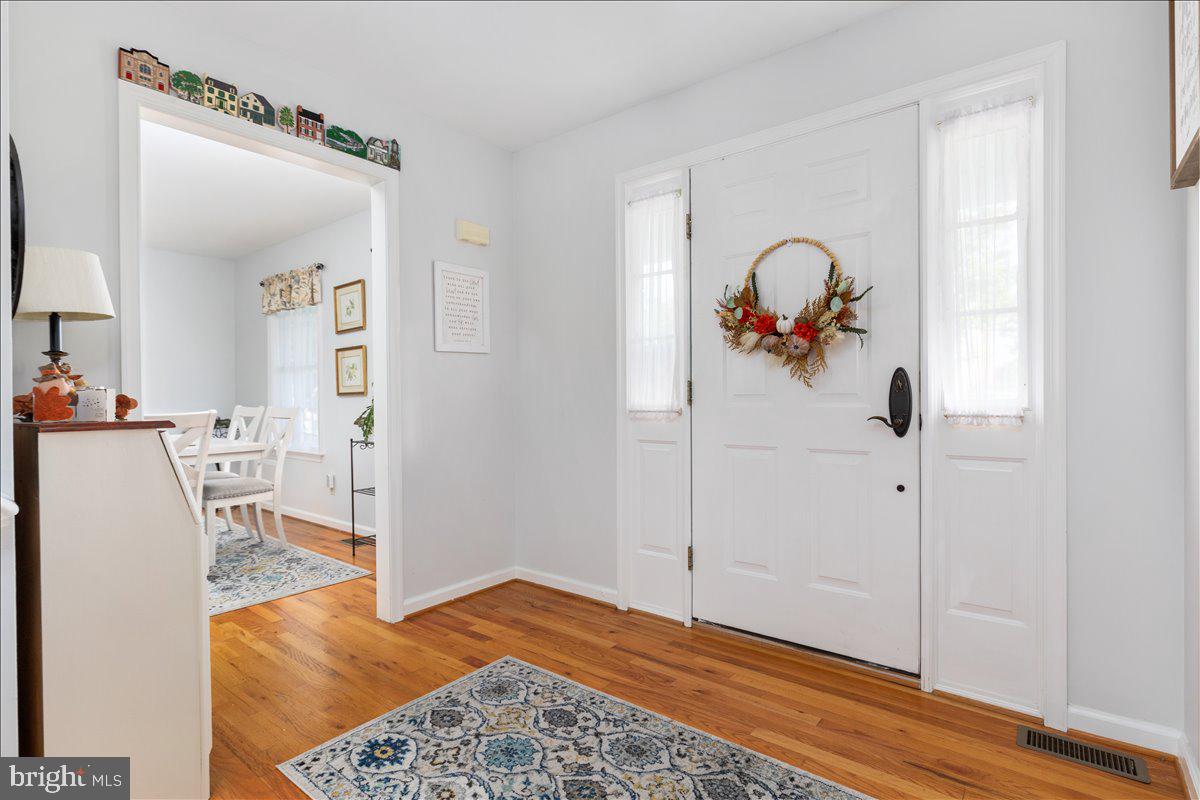 129 Old Wagon Road Winchester, VA 22602 - Photo 11 of 59 a living room with a rug and a table