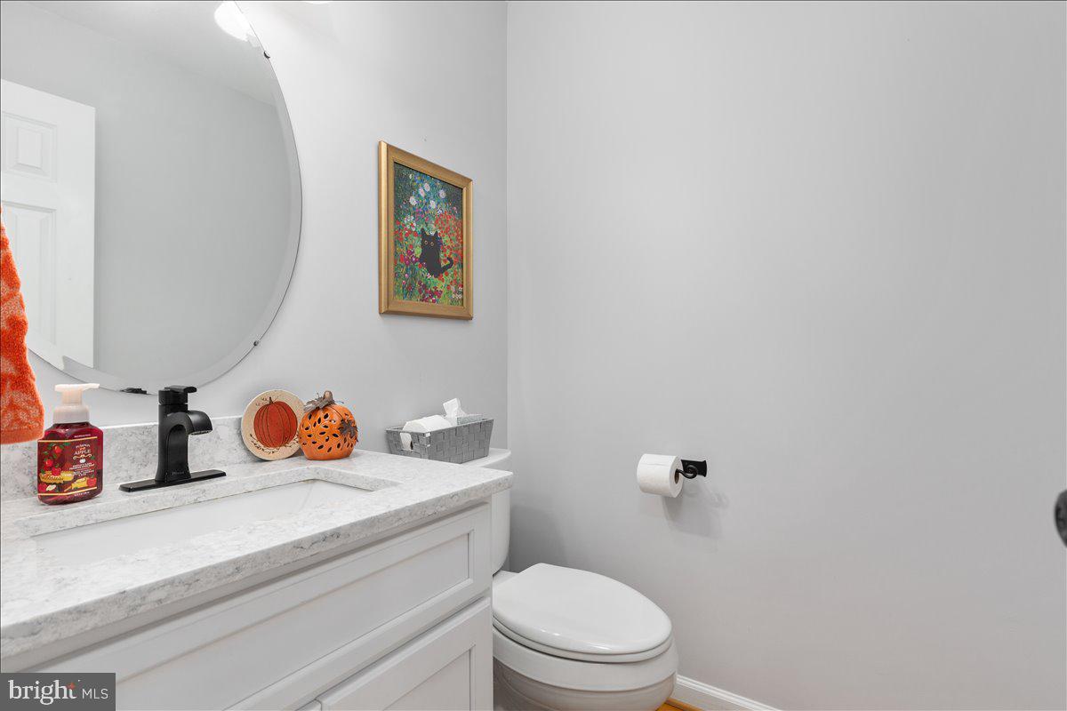 129 Old Wagon Road Winchester, VA 22602 - Photo 15 of 59 a bathroom with a toilet a sink and a shower