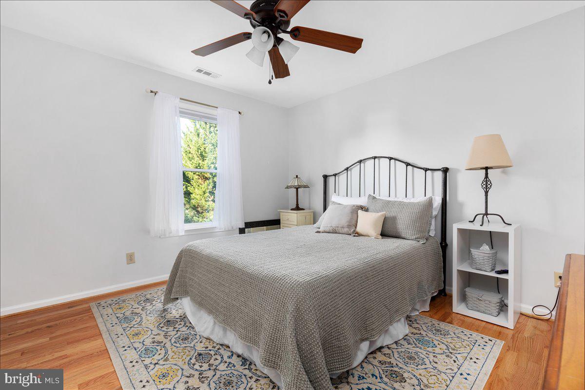 129 Old Wagon Road Winchester, VA 22602 - Photo 23 of 59 a bedroom with a bed and a window