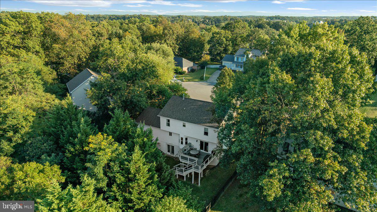 129 Old Wagon Road Winchester, VA 22602 - Photo 52 of 59 an aerial view of residential house with outdoor space and trees all around
