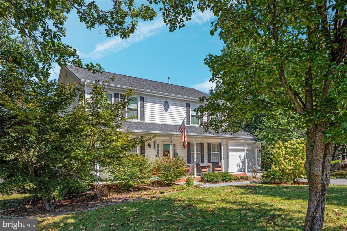129 Old Wagon Road Winchester, VA 22602 - Photo 56 of 59 a front view of a house with a yard