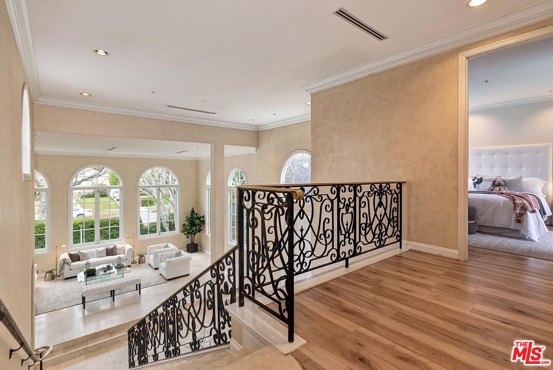 110 North Oakhurst Drive Beverly Hills, CA 90210 - Photo 13 of 29 a living room with furniture floor and a large window