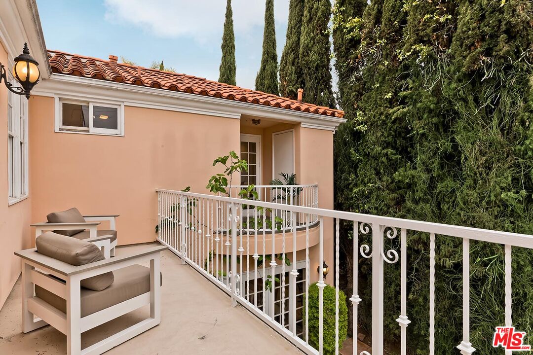 110 North Oakhurst Drive Beverly Hills, CA 90210 - Photo 15 of 29 a view of a balcony with furniture