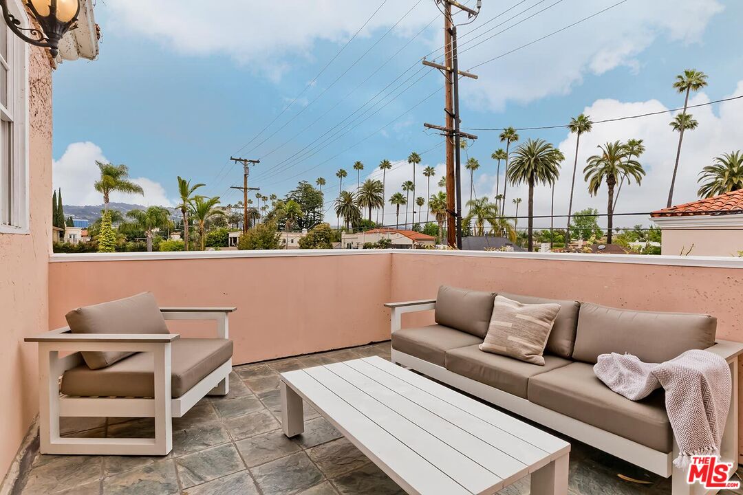 110 North Oakhurst Drive Beverly Hills, CA 90210 - Photo 18 of 29 a view of outdoor space with seating