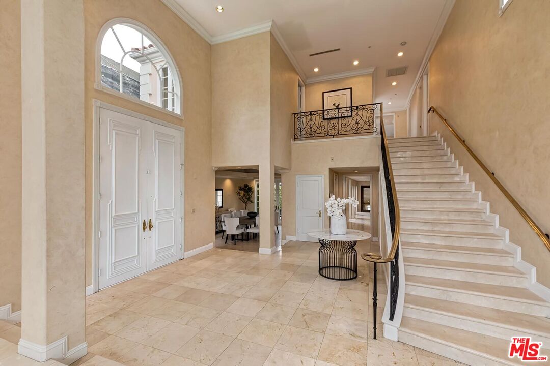 110 North Oakhurst Drive Beverly Hills, CA 90210 - Photo 3 of 29 a view of entryway and hall with wooden floor