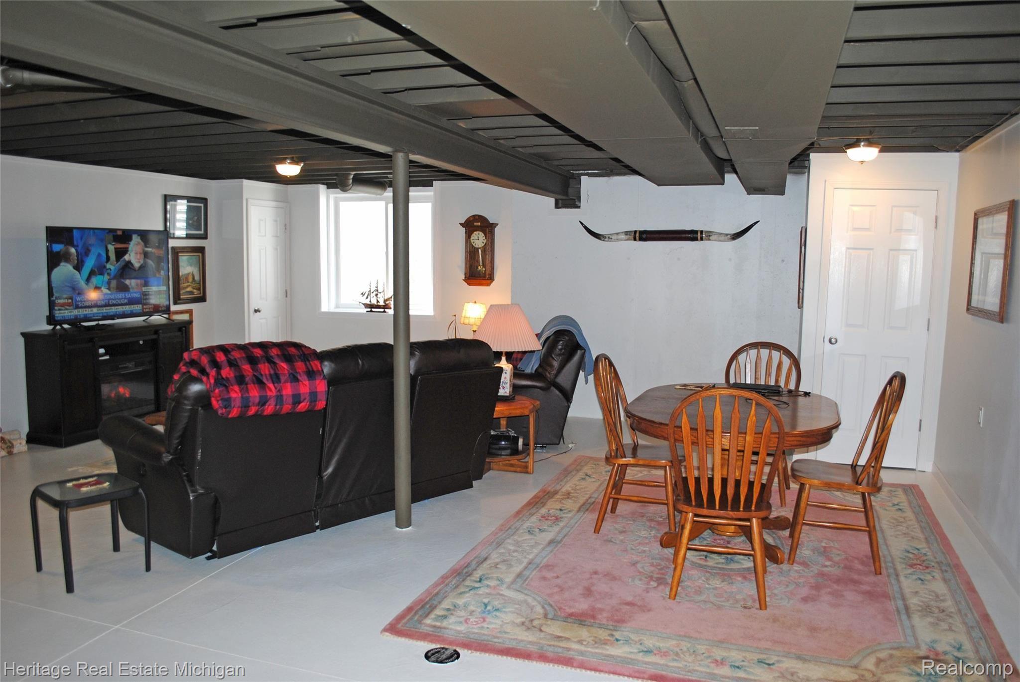 412 Brigg Street Howell, MI 48855 - Photo 14 of 20 The lower level has a phenomenal epoxy floor and many of the lower level walls have above recommended insulation!