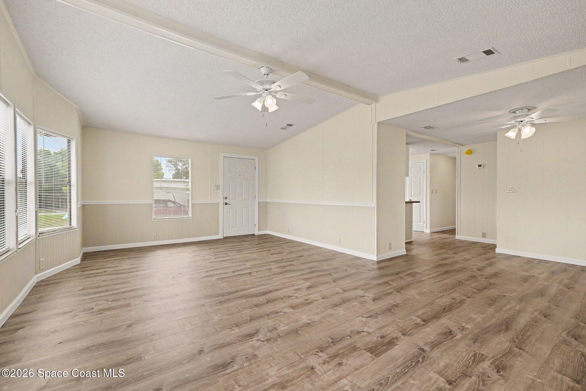 604 Breezeway Drive Cocoa, FL 32926 - Photo 11 of 26 Family Room with hallway view