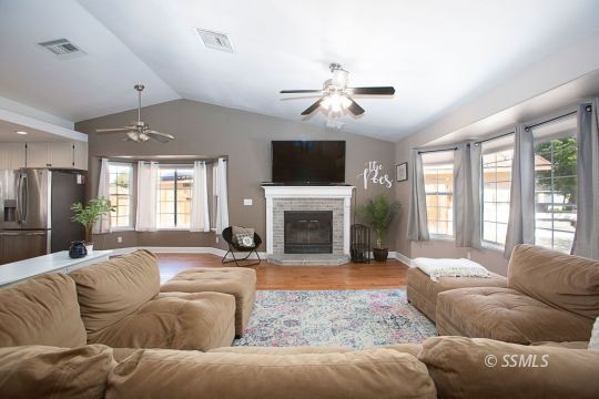 421 Christopher Court Ridgecrest, CA 93555 - Photo 2 of 50 a living room with furniture fireplace and flat screen tv
