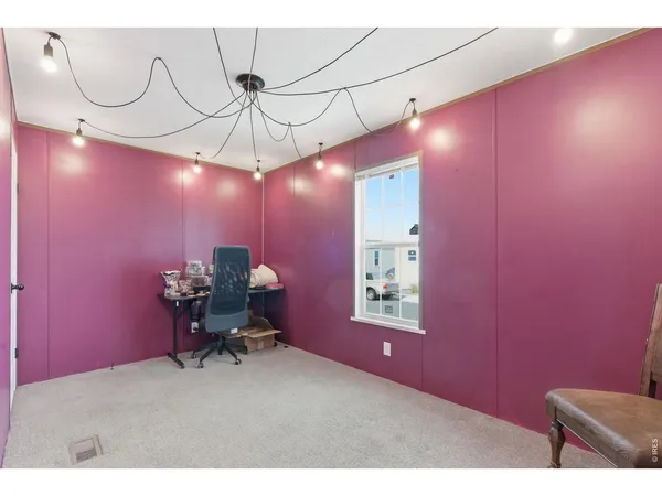 a room with furniture and chandelier