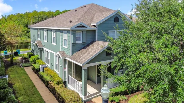 a house with trees in the background