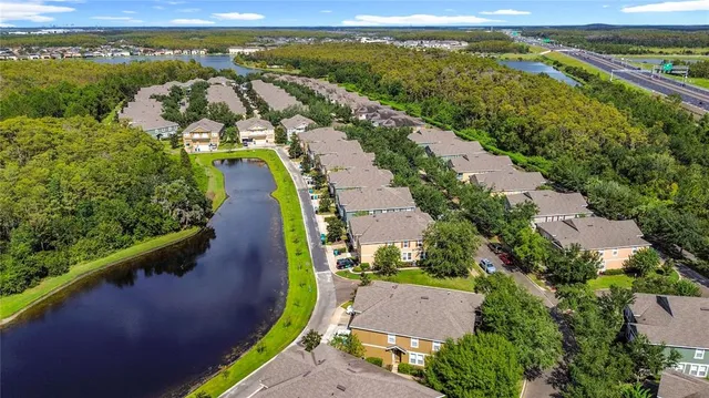 an aerial view of a house with a garden