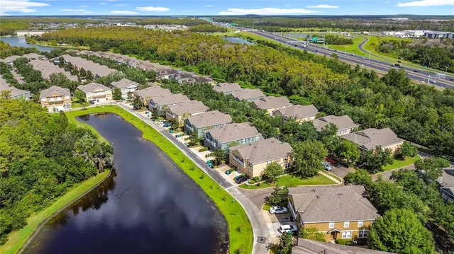 a view of a park with swings and slides