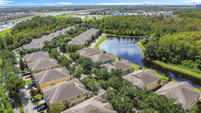 an aerial view of a house with a garden