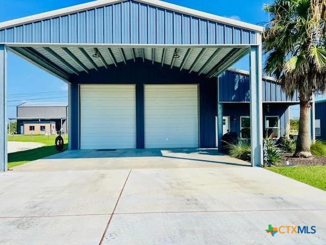 a view of outdoor space and a garage
